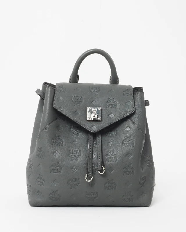 Anti-theft travel backpack with secret back pocket -MCM Grey Leather Embossed Logo Backpack