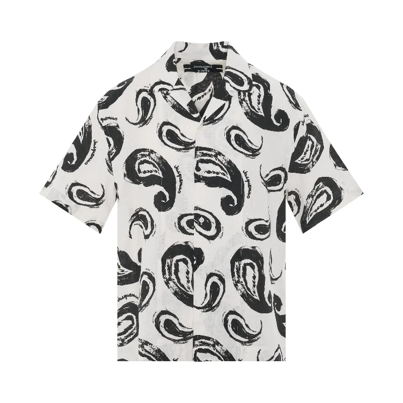 High-visibility backpack for cycling commute safety -Jean Short Sleeve Shirt in White/Black Paisley