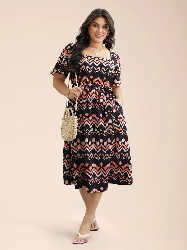 Plus size dresses with playful details add charm -Abstract Print Flutter Sleeve Midi Dress