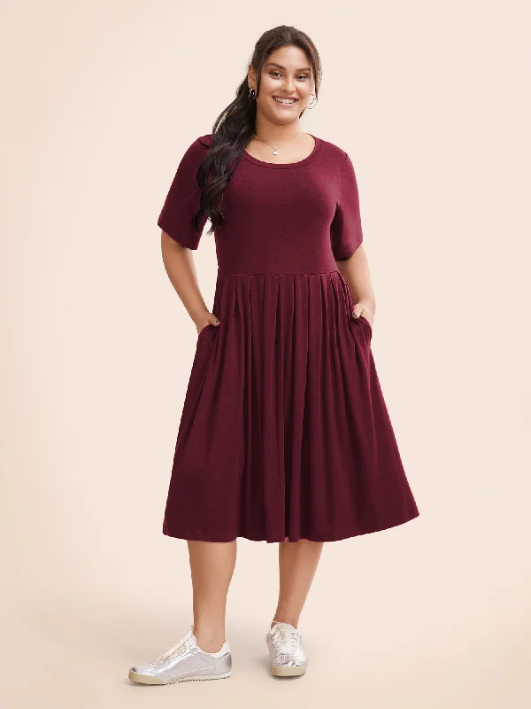 Plus size dresses for festive events shine loud -Supersoft Essentials Solid Pleated Round Neck Midi Dress