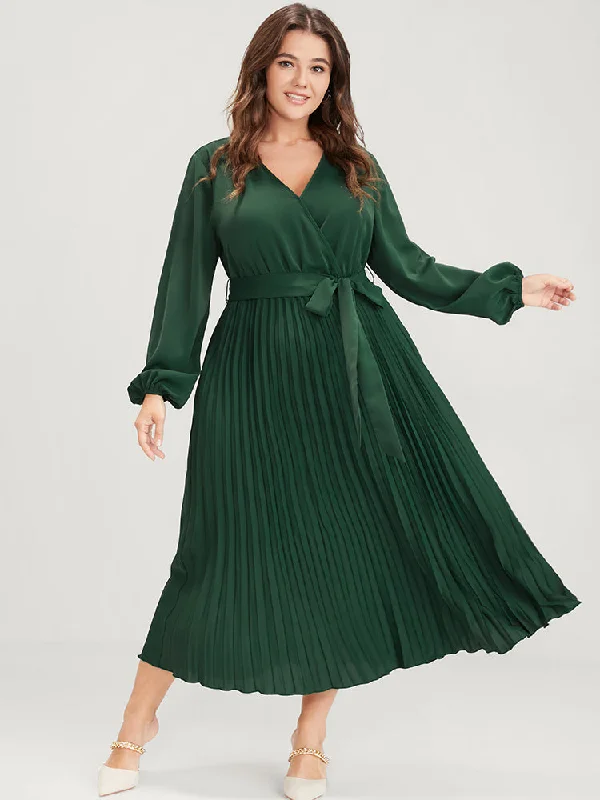 Plus size dresses featuring pleated skirts flow nicely -Solid Lantern Sleeve Belted Pleated Wrap Dress